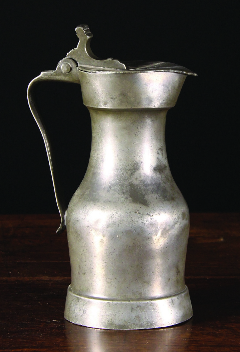 An Early 18th Century Paris style Pewter Pichet by Pierre de Lavigne, 10½ ins (27 cms) in height.