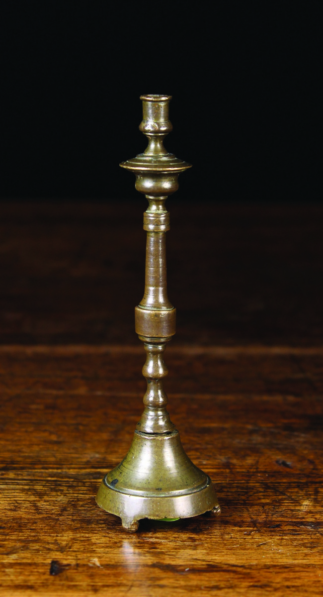 A Late 17th Century Miniature Spanish Brass Taper Stick.