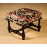 A 17th Century Oak Upholstered Stool.