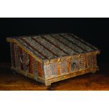 An Unusual Oak Desk Box, Circa 1700, possibly Russian, bound in intricately pierced iron straps,