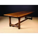 An Early 18th Century Figured Oak Refectory Table, probably Welsh.