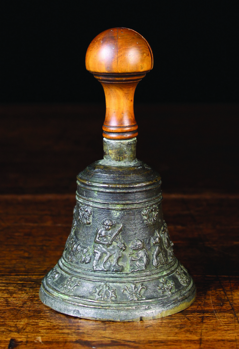 A 16th Century Flemish Bronze Table Bell cast in relief with Orpheus and animals,
