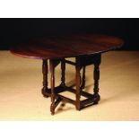 A 17th Century Dutch Oak Gateleg Table.