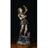 A 16th Century Polychromed Wood Carving of Saint George & the Dragon, 23 ins (58 cms) high.