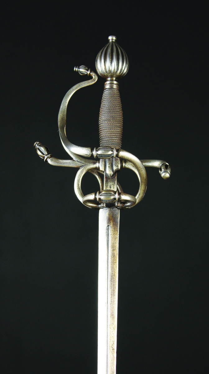 A 16th Century Italian Rapier with fluted knops to the loop and knuckle guard,