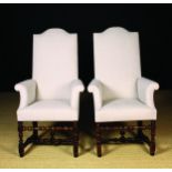 A Pair of Early 18th Century Upholstered Armchairs of modest proportions.