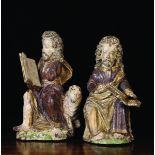 A Pair of 16th/17th Century Polychrome Carvings of Evangelists: The bearded figures with shoulder