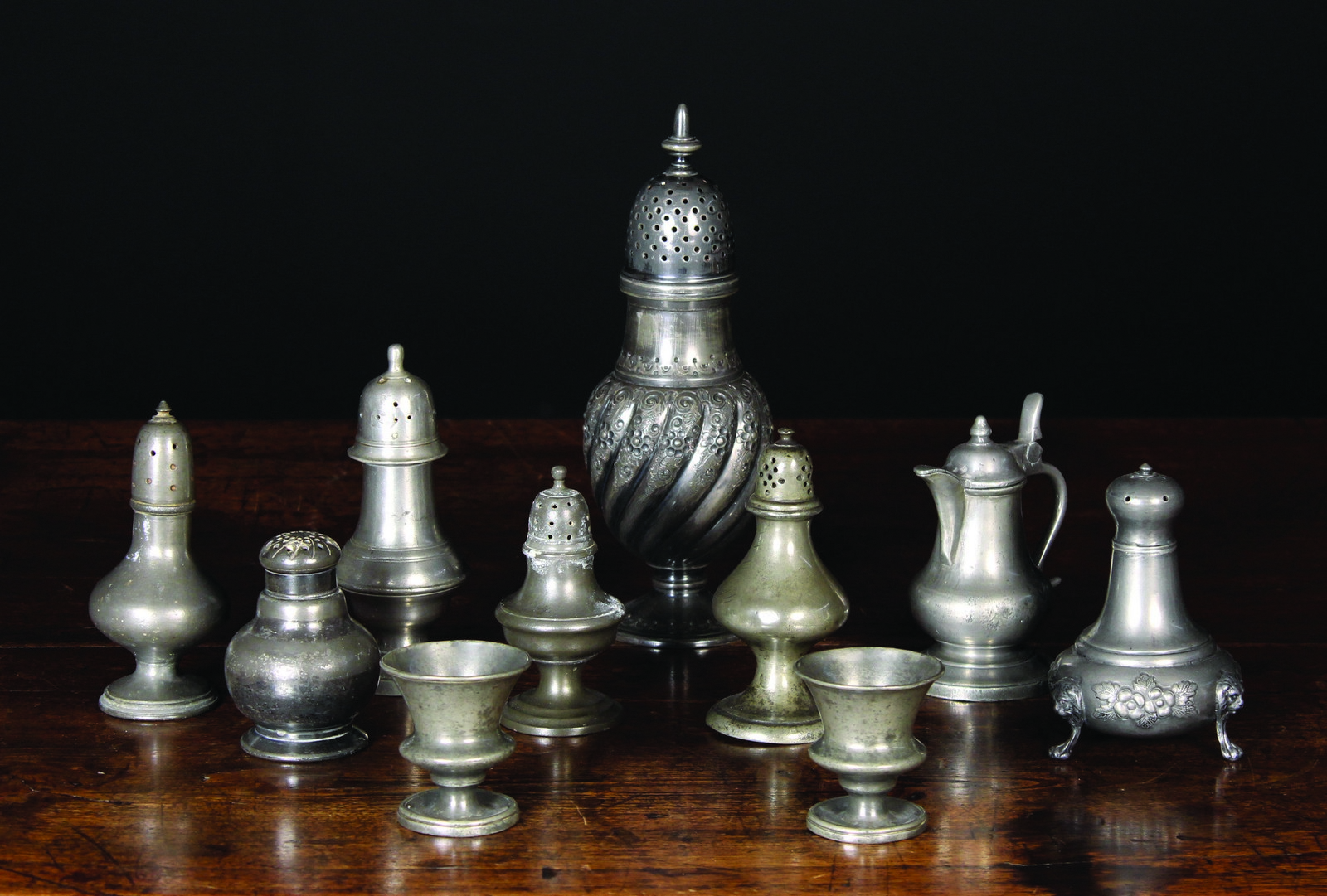 A Collection of Various Antique Pewter Cruets: Six salt/pepper shakers,