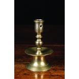 A 17th Century Brass Candlestick.