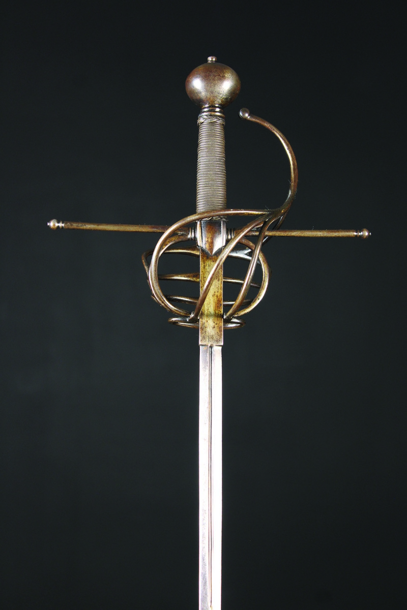 A 16th Century Type Dueling Rapier with swept hilt, 50 ins (127 cms) in length.