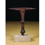 A Gothic Type Iron Anvil on a blade knopped hexagonal stem,