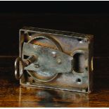 A 17th Century Iron Lock & Key with pincer mechanism in rectangular casing and original key,