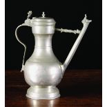 A Swiss Stegkanne or Spouted Bern Flagon by HK, Circa 1750, 12½ ins (32 cms) in height.