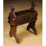 A Rare Carved Oak Gothic Tracery Box Stool with hinged lid.