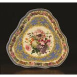 A Sèvres Style Porcelain Triform Cabaret Tray elaborately decorated with a bouquet of flowers to