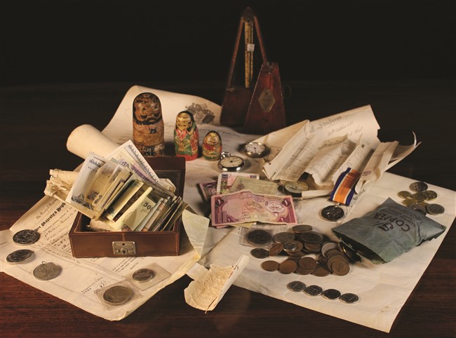 A Metronome, A Russian Doll painted as a Japanese man (A/F), Collection of Bank Notes, Coins,