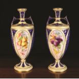 A Pair of Grainger Worcester Twin Handled Garniture Vases dated 1902.