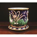 A Large Victorian George Jones Majolica Jardiniere on Stand.