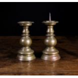 A Pair of Flemish Pricket-sticks with globular knopped stems,