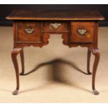 An 18th Century Early Georgian Oak Lowboy.