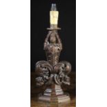 A Carved Oak 'Poppy-head' Pew-end Finial mounted on an octagonal moulded base and converted into a