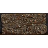 A Pair of Small 17th Century Oak Rails carved in relief with putti riding on the backs of