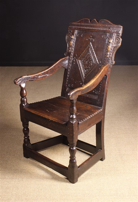 A 17th Century English Oak Wainscot Chair.