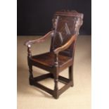 A 17th Century English Oak Wainscot Chair.