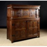 An 18th Century Oak Court Cupboard.