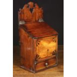 An 18th Century Inlaid Mahogany Salt Box. The back board having a crested top pierced with a heart.
