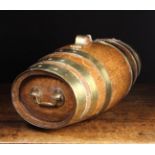 An Oval Coopered Oak Barrel bound in brass straps secured by copper rivets,