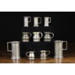 A Collection of Ten Small Pewter Measures.