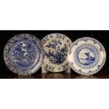 Three Large 18th Century Blue & White Delft Plates: The largest decorated with a fruit tree and
