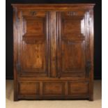 An 18th Century Joined Oak Press Cupboard.