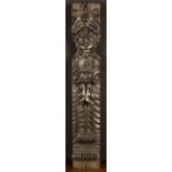 A 17th Century Carved Oak Term in the form of an Atlante, 20½ ins x 3½ ins (52 cms x 9 cms).