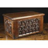 A French Gothic Style Carved Walnut Coffret.