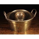 An Early 19th Century Brass Pan with twin handles,