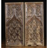 A Pair of 15th Century Oak Panels carved with spired Gothic arches crested with cusps of foliage