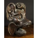 A 17th Century Style Relief Carved Animal Face Mask;