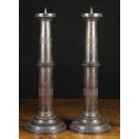 A Pair of Turned Dark Oak Pricket Candle Sticks by Mulberry (label to the base of one).