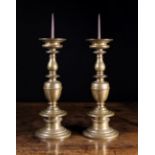 A Pair of Fine 17th Century Italian Bronze Pricket Candlesticks. The knopped stems stamped CAP:S.