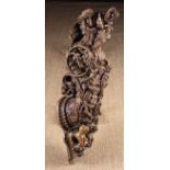 A Late 16th/Early 17th Century Ornamental Architectural Bracket intricately carved from wood with a