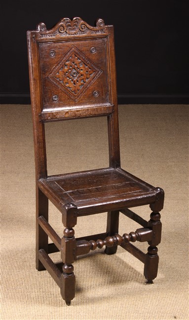 A Late 17th Century Oak Back Stool.