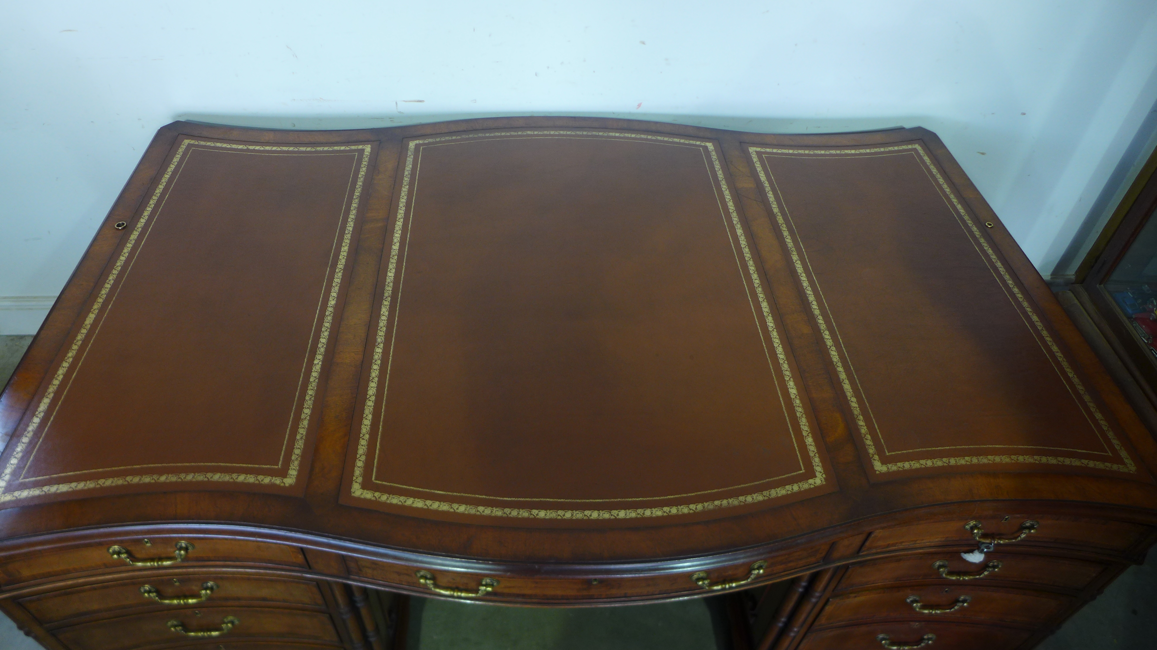 A good quality 20th century walnut and rosewood crossbanded serpentine fronted partners desk with - Image 4 of 4