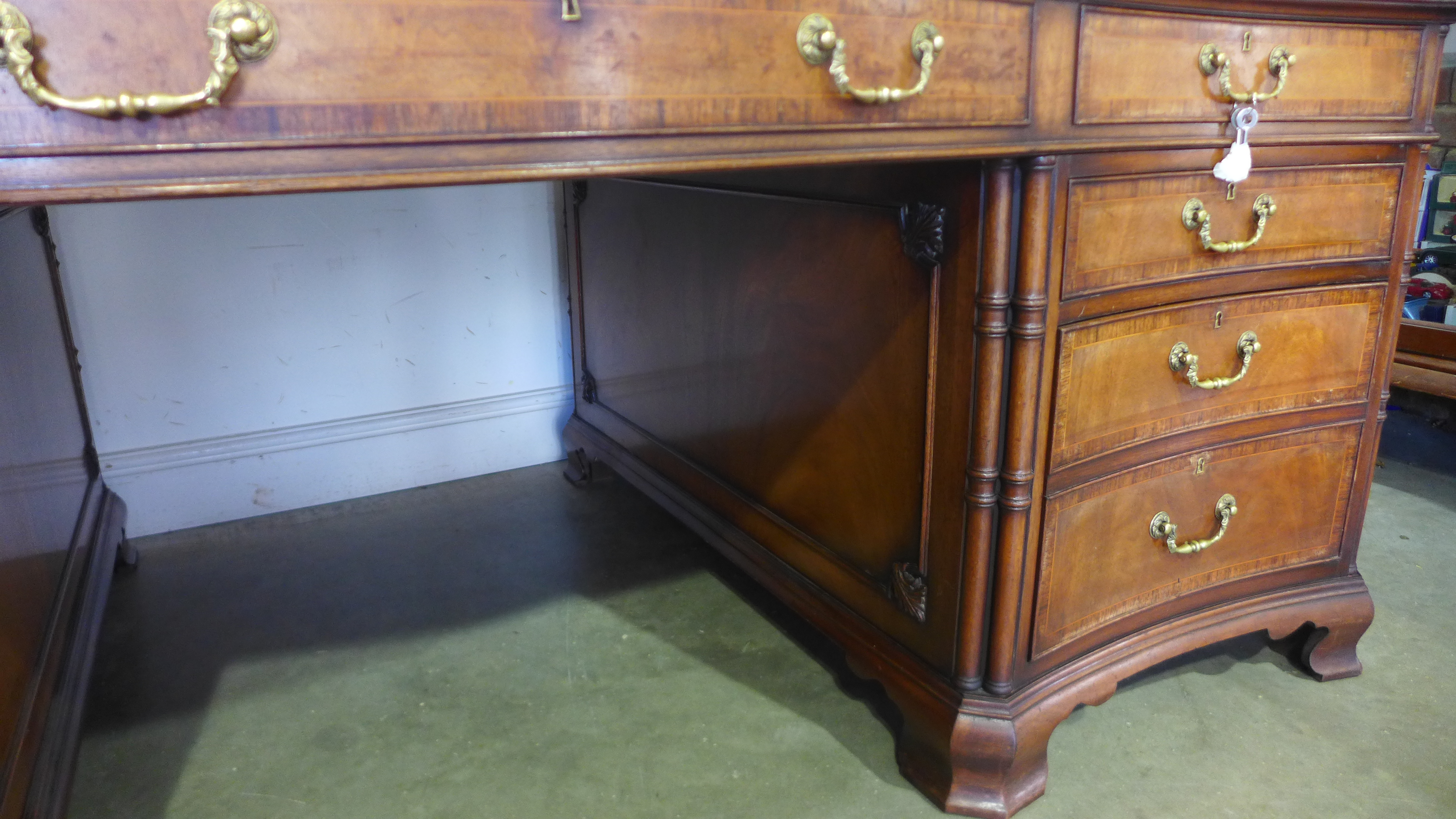 A good quality 20th century walnut and rosewood crossbanded serpentine fronted partners desk with - Image 3 of 4