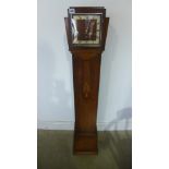 An Art Deco designed oak cased Grandmother clock,