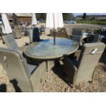 A Sahara elliptical table 212cm x 150cm with six recliners, cushions,