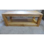 A modern oak coffee table with an under tier - Height 45cm x 120cm x 55cm