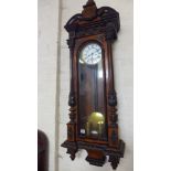 A large walnut double weight Vienna wall clock with weights and pendulum - Height 127cm Condition