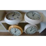 Four gents bakelite slave wall clocks with 12 inch dials - two damaged all over,